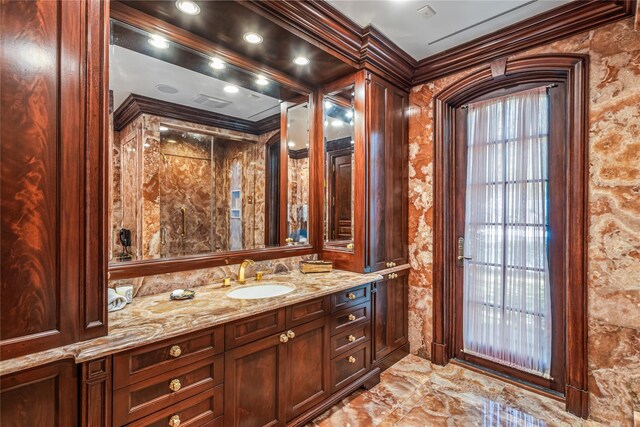 167 Brookville Rd, Brookville, NY 11545 - bathroom with crown molding, vanity, and marble finish floors