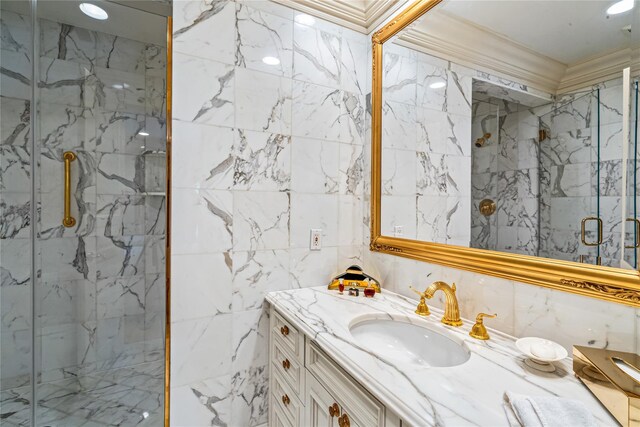 167 Brookville Rd, Brookville, NY 11545 - bathroom featuring vanity, a marble finish shower, tile walls, and crown molding