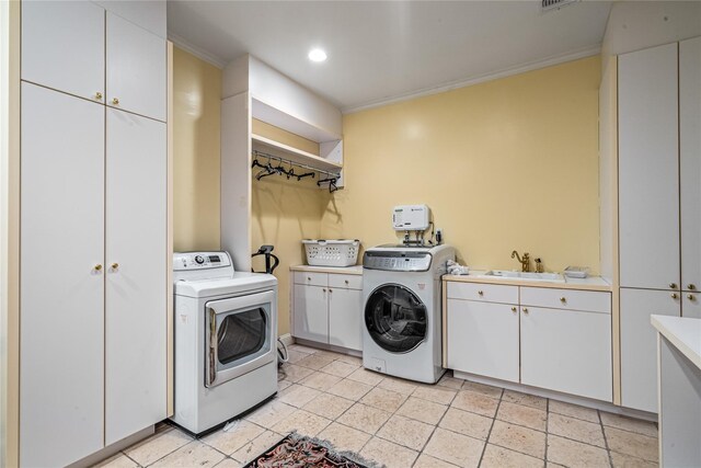 167 Brookville Rd, Brookville, NY 11545 - laundry area with washer / clothes dryer, cabinet space, crown molding, and recessed lighting