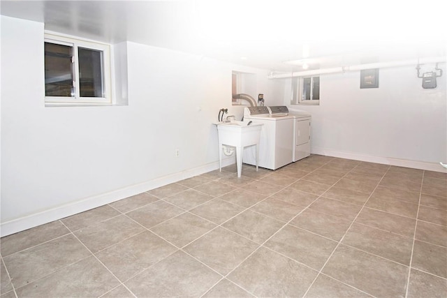 437 Carroll Ave, Mamaroneck, NY 10543 - washroom with separate washer and dryer, electric panel, baseboards, and light tile patterned floors