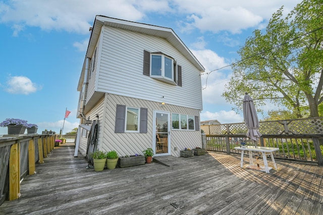 331 Cross Bay Blvd, Broad Channel, NY 11693 - rear view of property with a deck