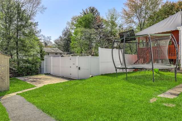 104 W Maple Ave, Monsey, NY 10952 - view of yard with fence and a trampoline
