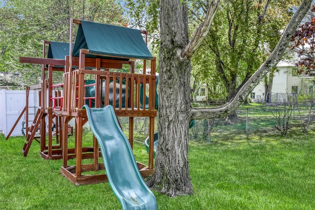 104 W Maple Ave, Monsey, NY 10952 - view of playground featuring fence and a lawn