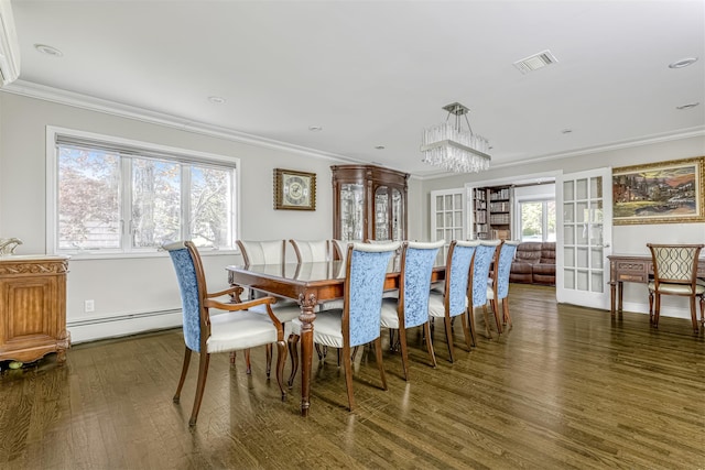 104 W Maple Ave, Monsey, NY 10952 - dining area featuring visible vents, crown molding, wood finished floors, a baseboard heating unit, and a chandelier