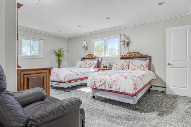 104 W Maple Ave, Monsey, NY 10952 - bedroom with ornamental molding, a baseboard heating unit, and multiple windows