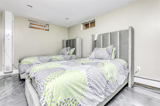 104 W Maple Ave, Monsey, NY 10952 - bedroom featuring a baseboard radiator and recessed lighting