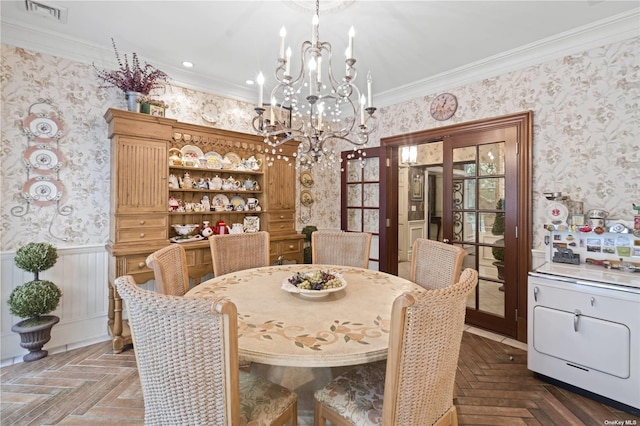 822 Bryant Ave, Roslyn Harbor, NY 11576 - dining space with crown molding, wallpapered walls, visible vents, and wainscoting