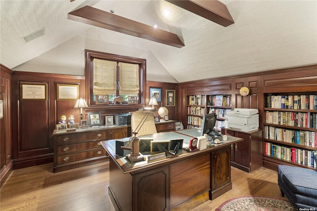 822 Bryant Ave, Roslyn Harbor, NY 11576 - office space with visible vents, wood walls, wood finished floors, and vaulted ceiling