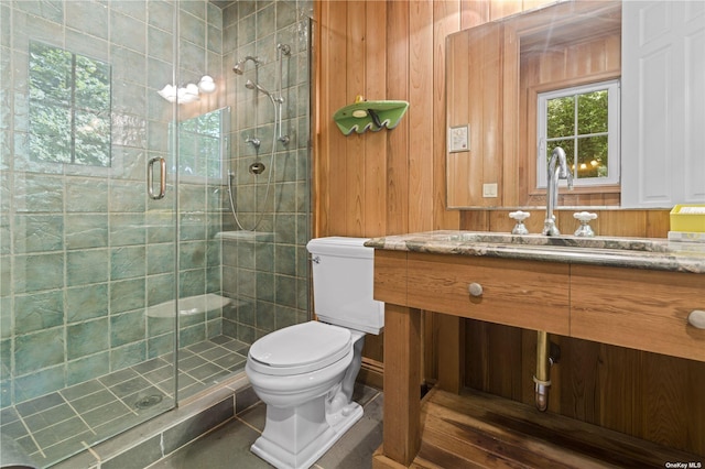 822 Bryant Ave, Roslyn Harbor, NY 11576 - bathroom featuring vanity, wood walls, toilet, and a shower stall