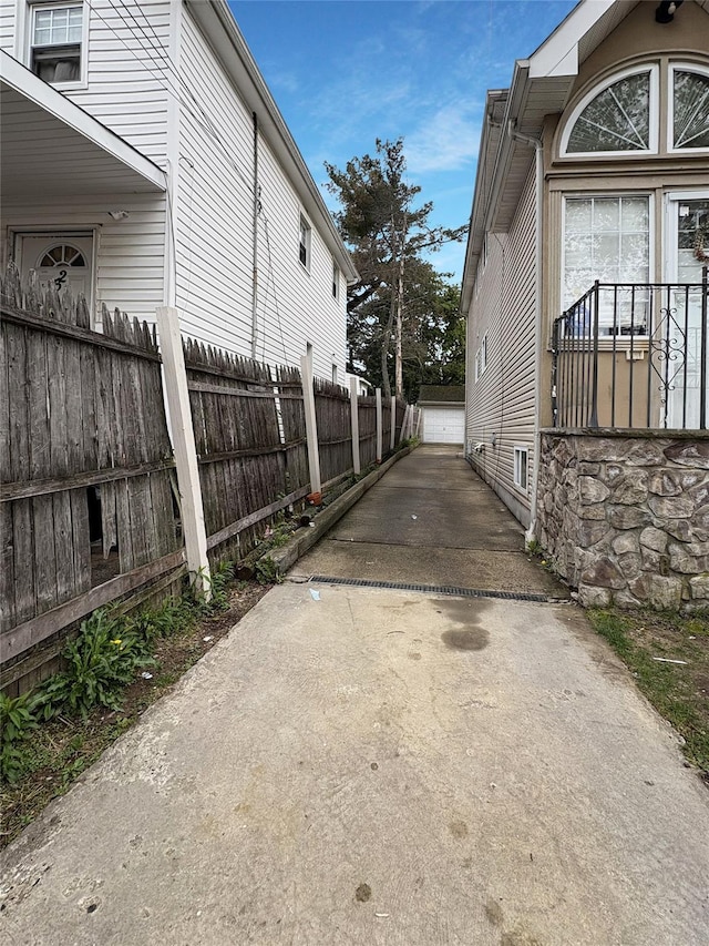 view of property exterior featuring fence