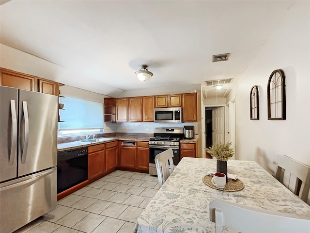 kitchen featuring open shelves, appliances with stainless steel finishes, a sink, light tile patterned floors, and visible vents