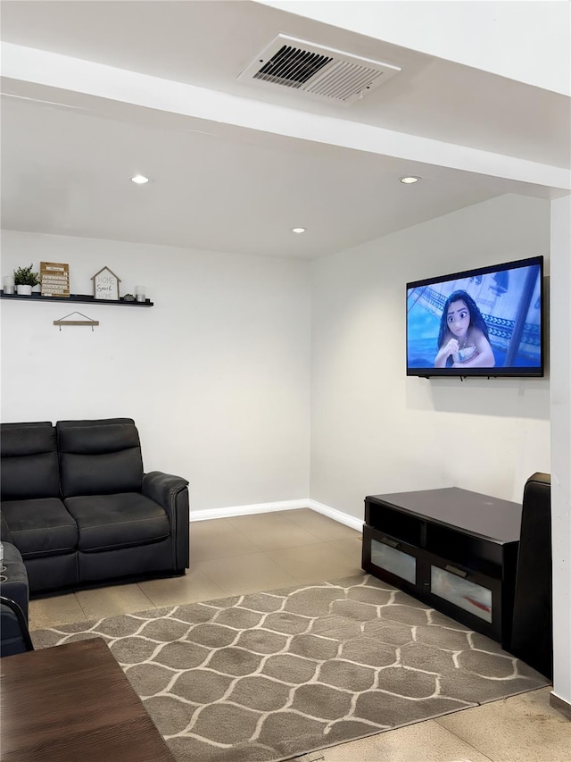 living room with visible vents, recessed lighting, and baseboards