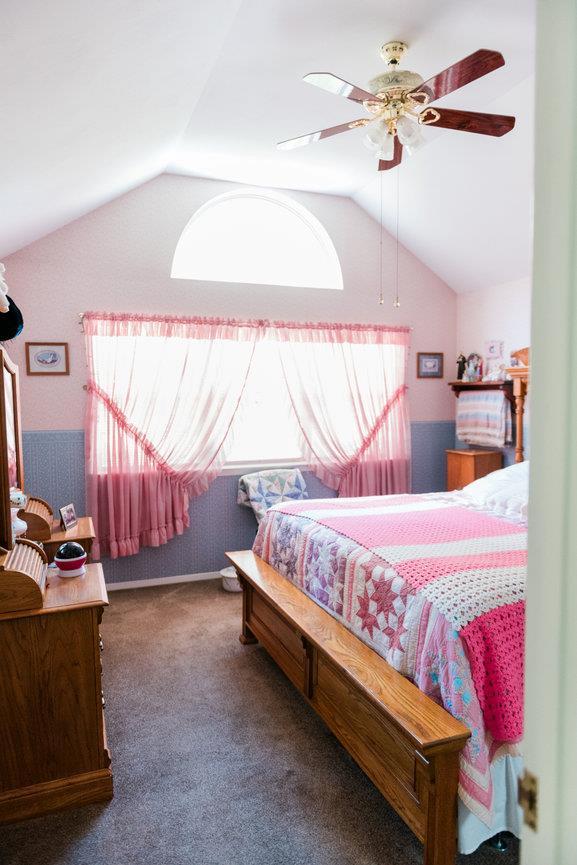 3 Cloister Ln, Middle Island, NY 11953 - bedroom featuring a ceiling fan, vaulted ceiling, and carpet flooring