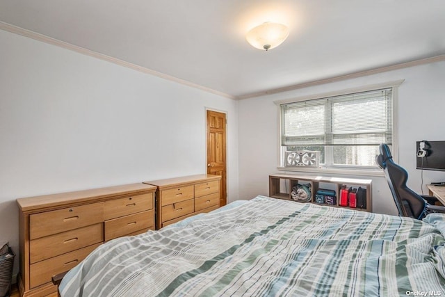 bedroom with crown molding