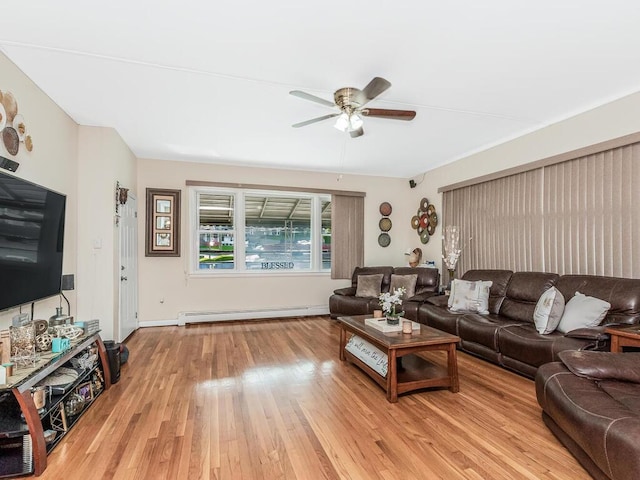 314 Mclean Ave, Yonkers, NY 10705 - living room featuring baseboards, a ceiling fan, light wood finished floors, and a baseboard heating unit