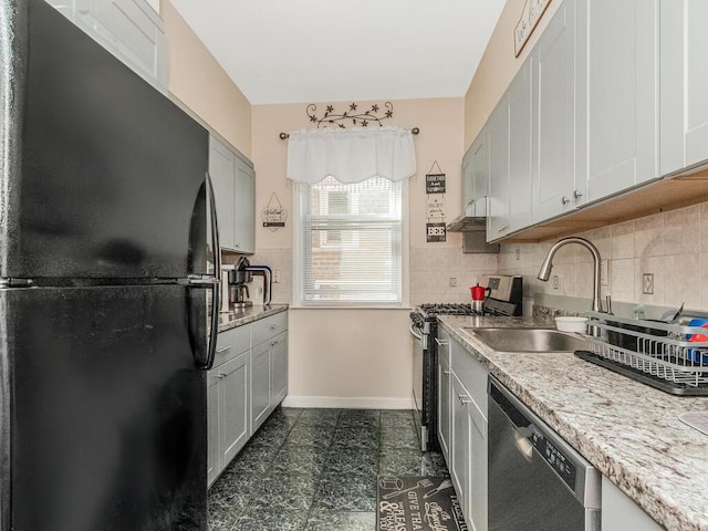 314 Mclean Ave, Yonkers, NY 10705 - kitchen with baseboards, a sink, backsplash, and stainless steel appliances