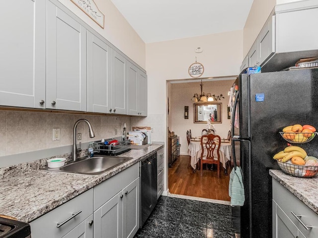 314 Mclean Ave, Yonkers, NY 10705 - kitchen featuring a sink, granite finish floor, freestanding refrigerator, tasteful backsplash, and dishwashing machine