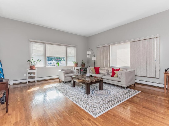 314 Mclean Ave, Yonkers, NY 10705 - living area featuring wood finished floors and baseboard heating