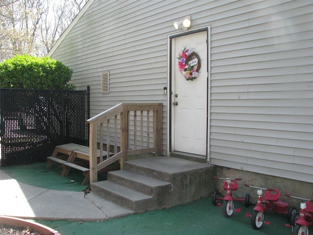 20 Clover St, Mastic, NY 11950 - property entrance featuring fence