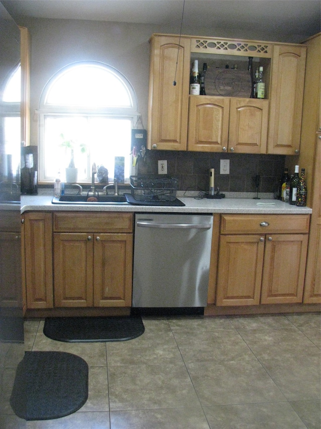 20 Clover St, Mastic, NY 11950 - kitchen featuring a sink, light countertops, tasteful backsplash, and dishwasher