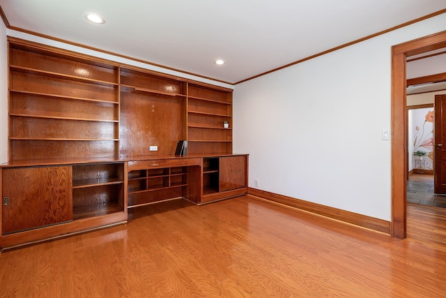 unfurnished living room featuring crown molding, recessed lighting, baseboards, and wood finished floors