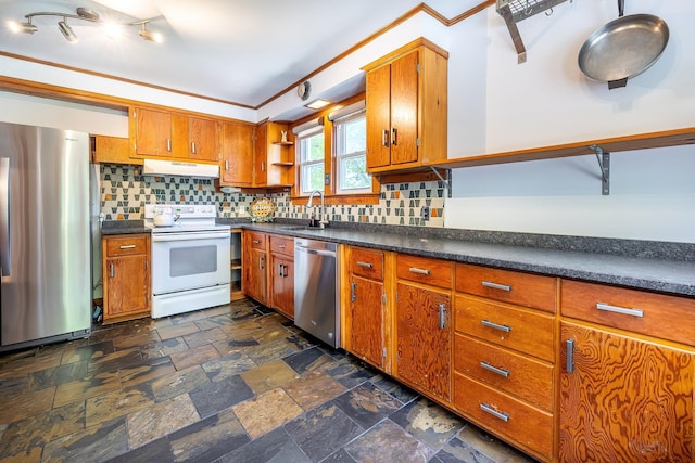 kitchen with dark countertops, appliances with stainless steel finishes, open shelves, and under cabinet range hood
