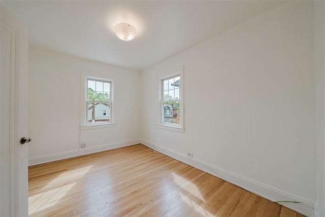 4220 Wickham Ave, Bronx, NY 10466 - empty room with baseboards and light wood-style flooring