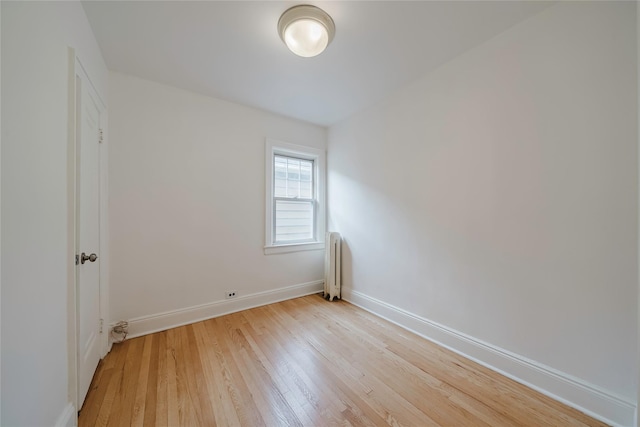 4220 Wickham Ave, Bronx, NY 10466 - unfurnished room featuring radiator heating unit, baseboards, and light wood-type flooring