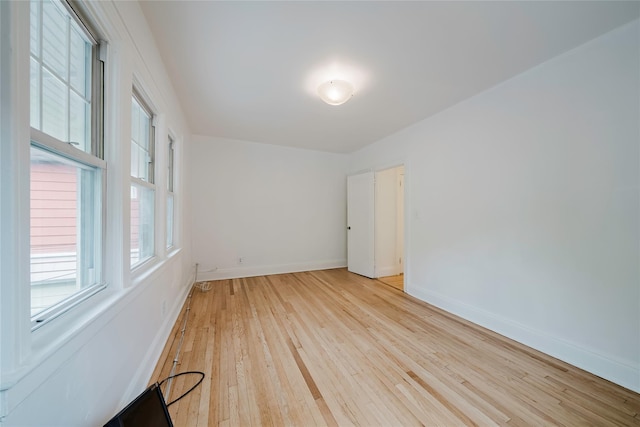 4220 Wickham Ave, Bronx, NY 10466 - unfurnished room with baseboards and light wood finished floors