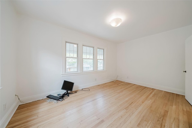 4220 Wickham Ave, Bronx, NY 10466 - empty room with baseboards and light wood-style flooring