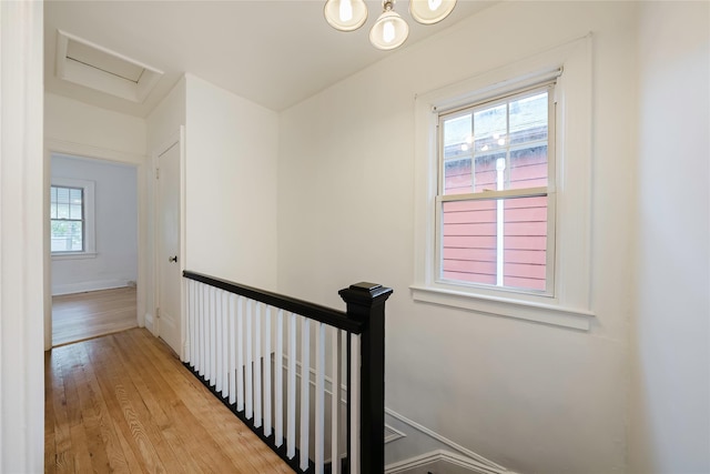4220 Wickham Ave, Bronx, NY 10466 - staircase featuring baseboards, attic access, and hardwood / wood-style flooring