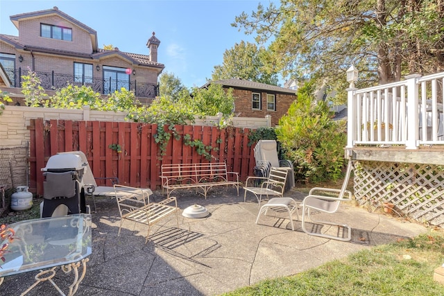 view of patio with fence
