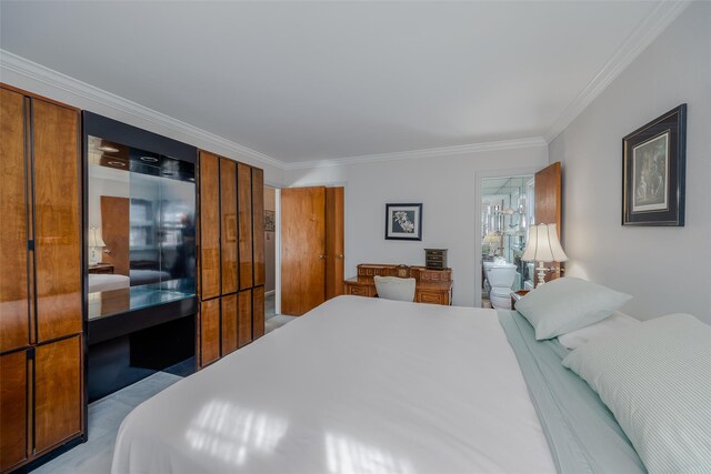 bedroom with crown molding