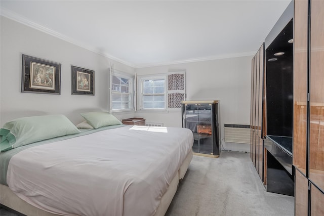 bedroom with crown molding and light carpet