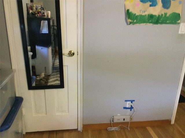 268-03 83rd Ave Fl 2Nd, Floral Park, NY 11040 - details featuring baseboards and wood finished floors