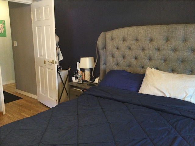 268-03 83rd Ave Fl 2Nd, Floral Park, NY 11040 - bedroom featuring baseboards and wood finished floors