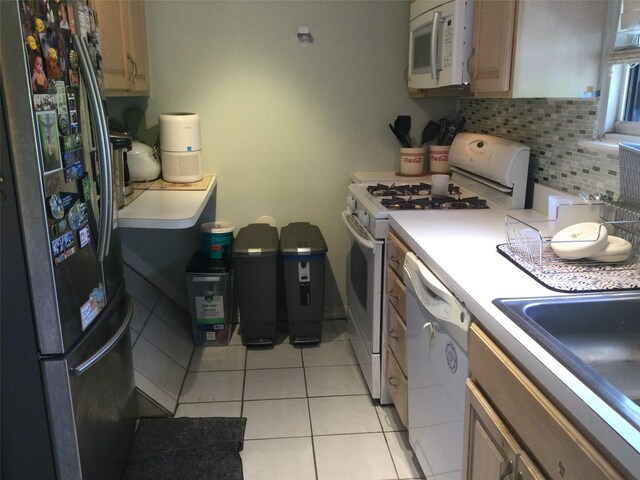 268-03 83rd Ave Fl 2Nd, Floral Park, NY 11040 - kitchen featuring white appliances, backsplash, light tile patterned flooring, and light countertops