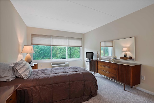 100 High Point Dr Unit 504, Hartsdale, NY 10530 - bedroom with carpet flooring, a wall unit AC, and baseboards