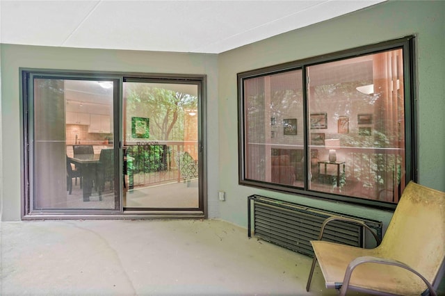 100 High Point Dr Unit 504, Hartsdale, NY 10530 - entryway with radiator heating unit and concrete flooring