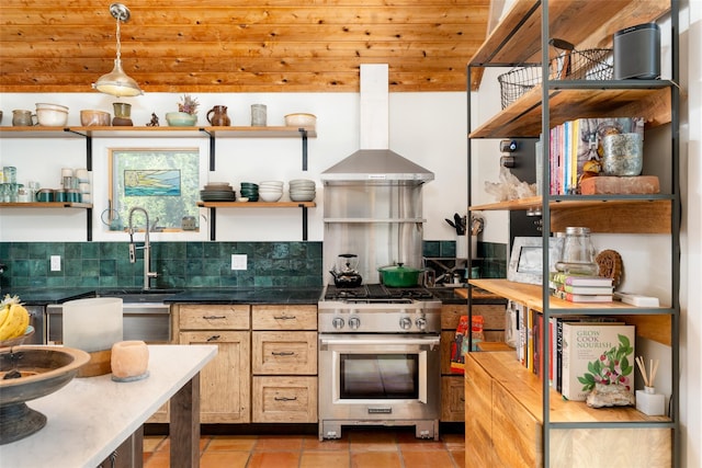 kitchen with wall chimney range hood, open shelves, gas stove, decorative light fixtures, and backsplash