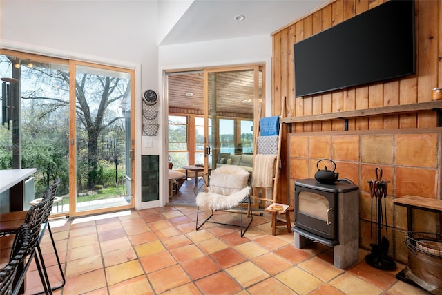 living area featuring a wood stove