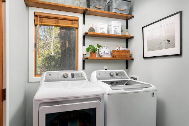 washroom featuring laundry area and independent washer and dryer