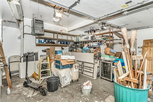 garage with a heating unit and a garage door opener