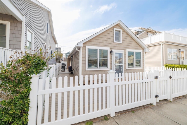 323 New York Ave, Long Beach, NY 11561 - bungalow-style house with a gate and a fenced front yard