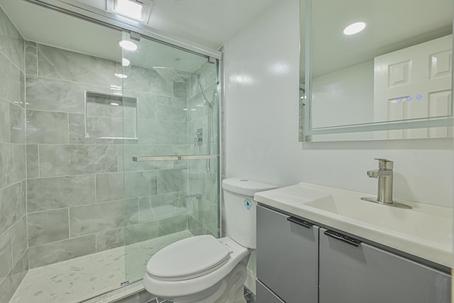 100 Morris Pkwy, Valley Stream, NY 11580 - bathroom featuring vanity, a stall shower, and toilet