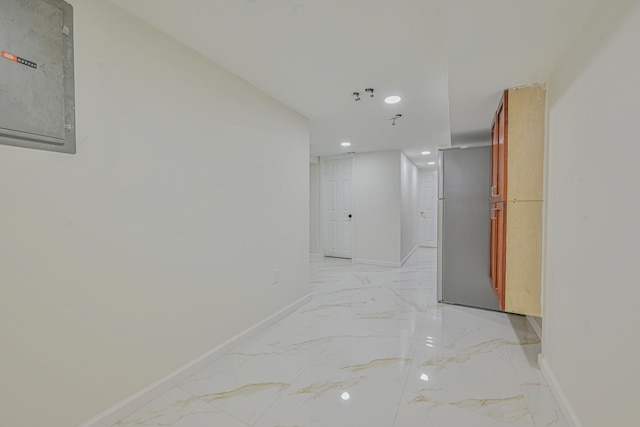 100 Morris Pkwy, Valley Stream, NY 11580 - hallway featuring baseboards, recessed lighting, marble finish floor, and electric panel