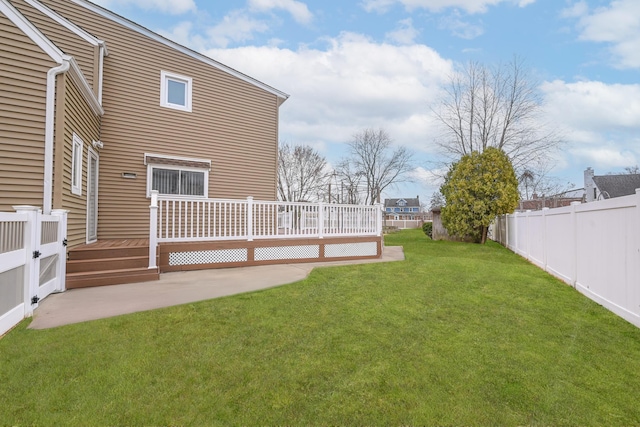 100 Morris Pkwy, Valley Stream, NY 11580 - view of yard with fence, a wooden deck, and a patio area