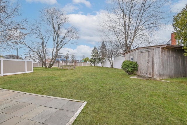 100 Morris Pkwy, Valley Stream, NY 11580 - view of yard with an outdoor structure, a fenced backyard, and a shed