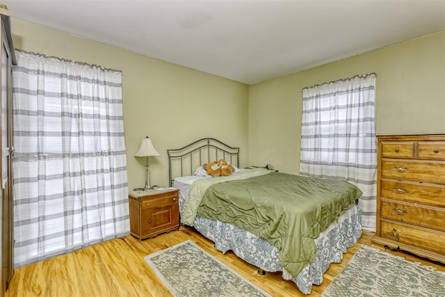 bedroom featuring light wood-type flooring