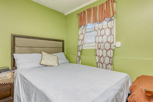 bedroom with crown molding